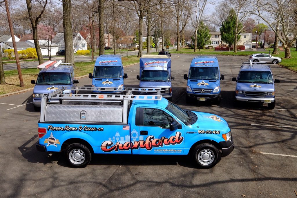The bright blue fleet used by our Summit NJ plumbing and HVAC experts
